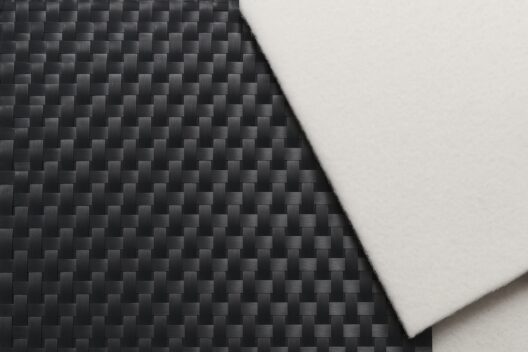 Side-by-side comparison of a stiff woven geotextile and a flexible nonwoven geotextile