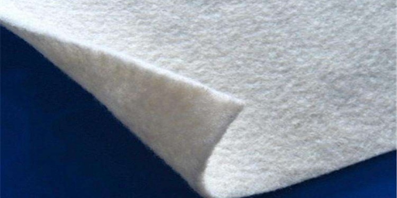 Staple fiber needle-punched nonwoven geotextile fabric