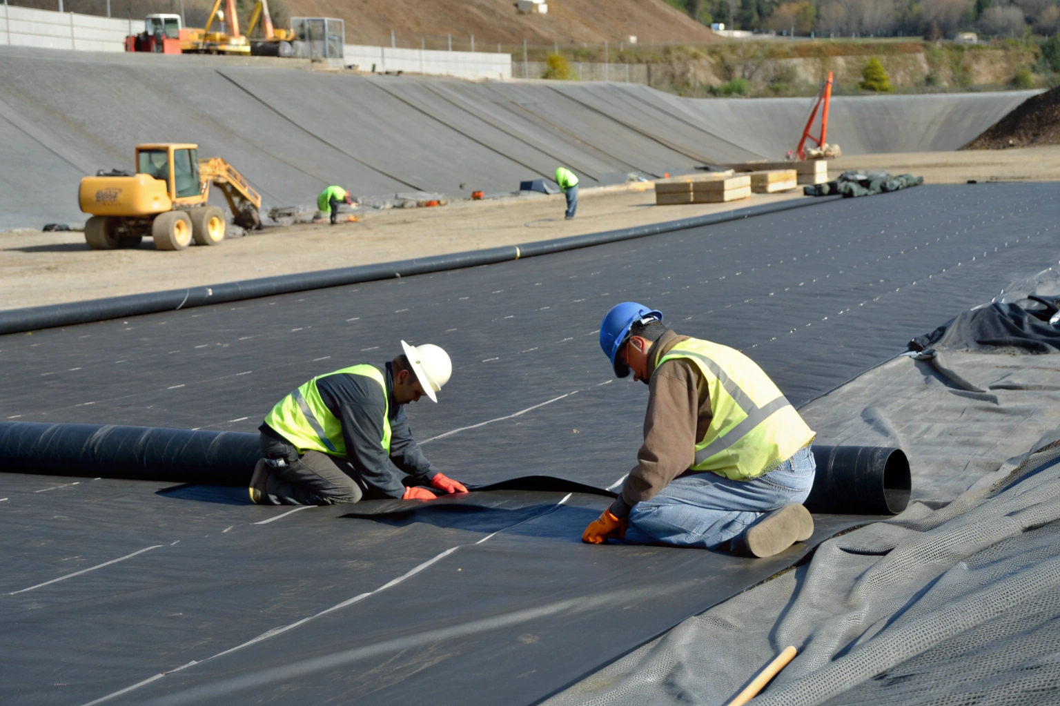 A collage of HDPE geomembrane rolls of different thicknesses being prepared for a project