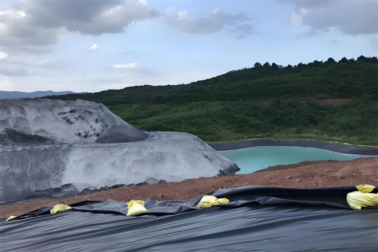 A close-up view of the rough, textured surface of an HDPE geomembrane