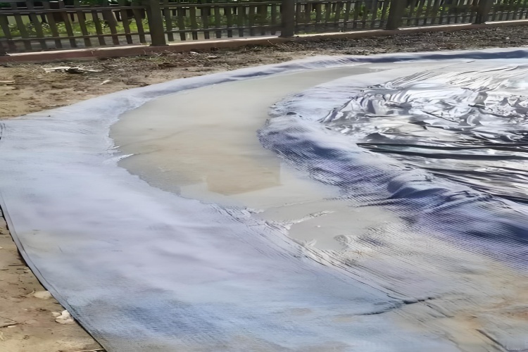 A construction site where GCL rolls have been soaked by rain