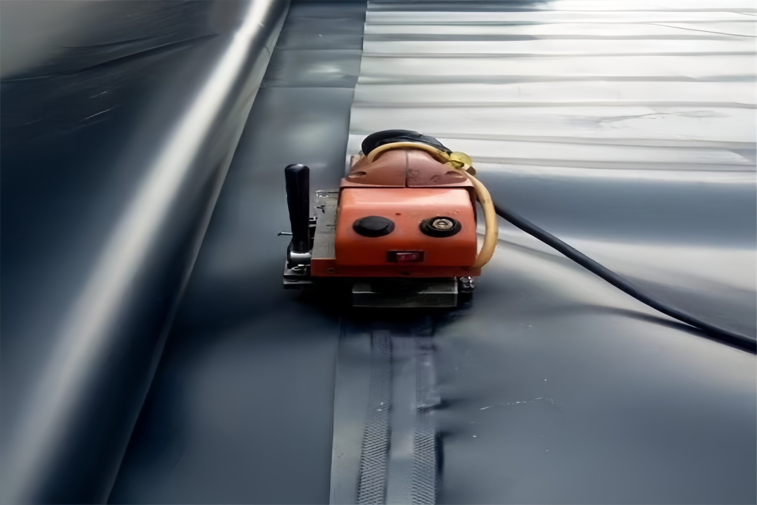 Large-scale HDPE geomembrane installation at a landfill site