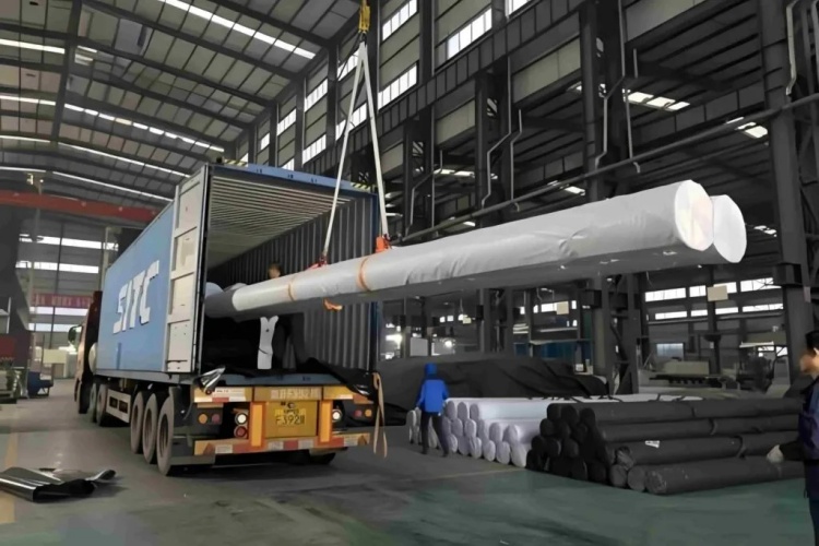 Geomembrane rolls stacked and ready for export in a warehouse