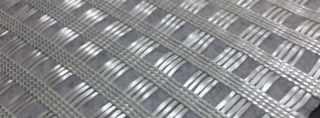 Warp-Knitted Reinforced Geotextile composite of polyester yarns and nonwoven fabric