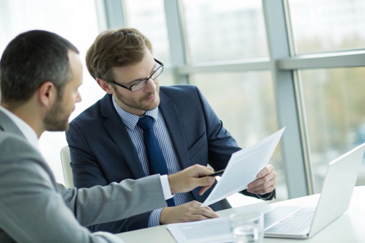 A container ship loaded with cargo at a busy international port