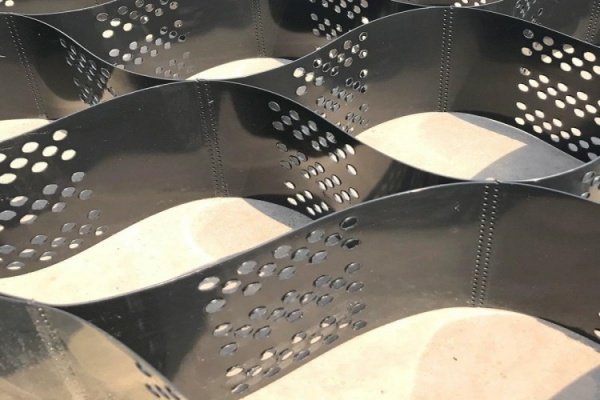 Close-up shots comparing the texture of virgin HDPE vs. recycled plastic geocell