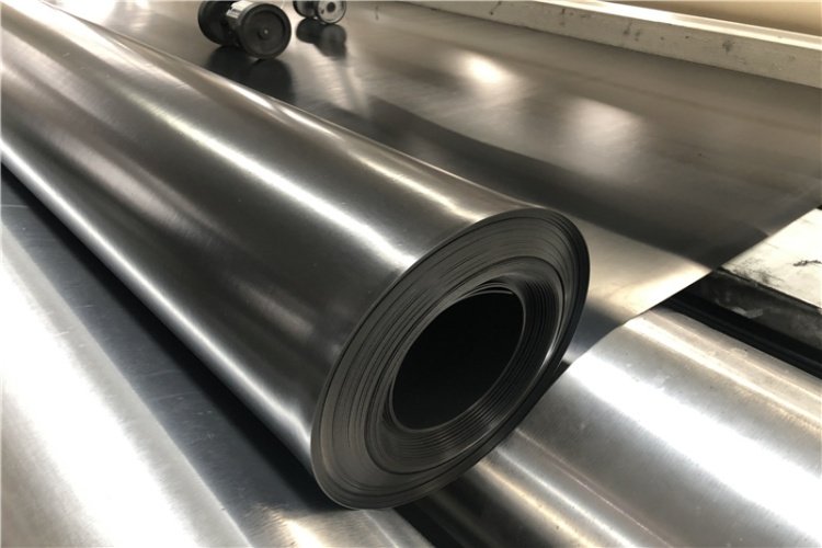 A geomembrane sample undergoing an accelerated UV weathering test in a lab chamber