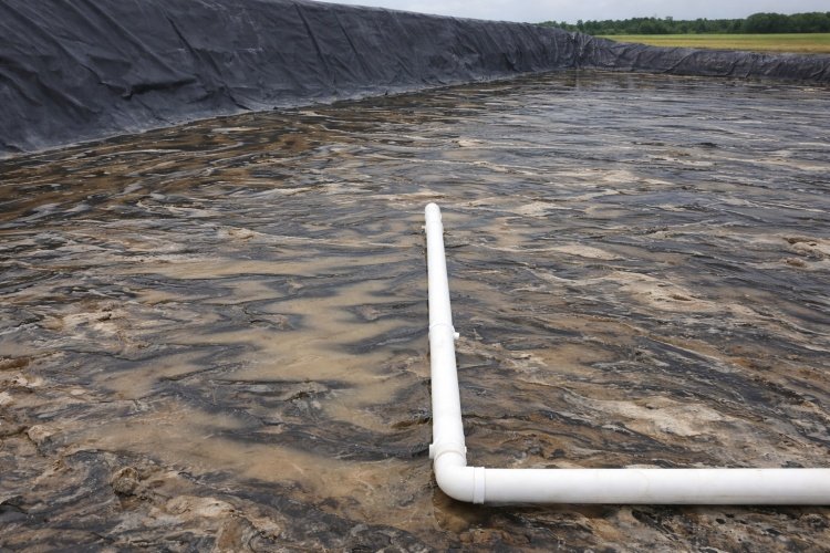 Close up of pipe penetration through liner