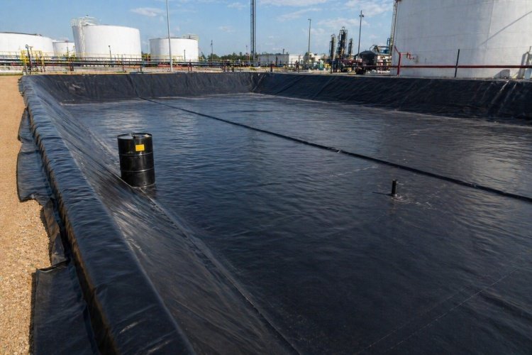 HDPE geomembrane installed for industrial oil spill containment