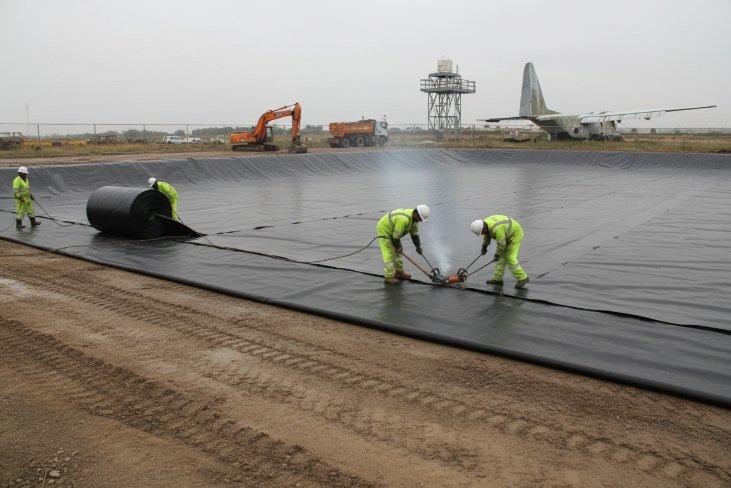 Welding HDPE geomembrane liner on a project site